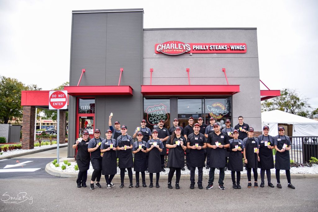 Charleys franchise employees in front of store